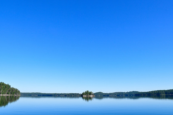 Blue sky over Blueberry Island, Sturgeon Lake