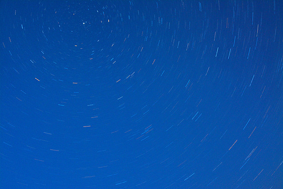 Stars circle the North Star above David Lake