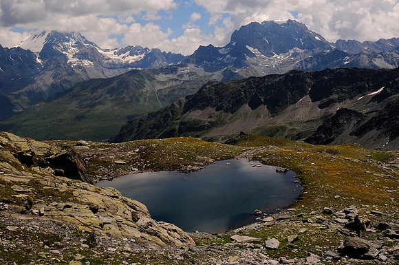 The Gouille du Dragon from the Pointe des Planards, with the Grand Combin in the distance