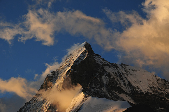 Sunrise on the northwest ridge of the Matterhorn, seen from the Schönbiel Hut