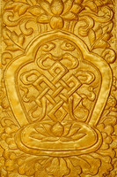 Metalwork of the Endless Knot at the entrance to the new gompa near the end of the Druk Path Trek