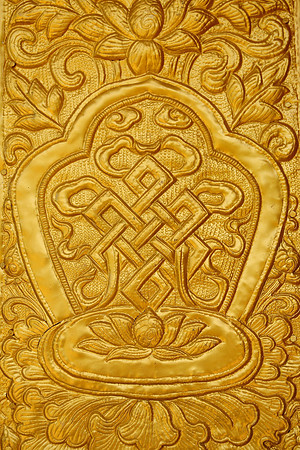 Metalwork of the Endless Knot at the entrance to the new gompa near the end of the Druk Path Trek