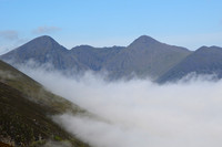Carrauntoohil and Beenkeragh above the clouds, seen from Cnoc na dTarbh, MacGillycuddy's Reeks, County Kerry