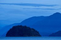 Looking north from Feather Cove before sunrise.  The dome-shaped island is Station Island and West Redonda Island is behind it.