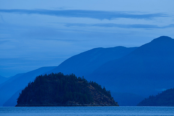 Looking north from Feather Cove before sunrise.  The dome-shaped island is Station Island and West Redonda Island is behind it.