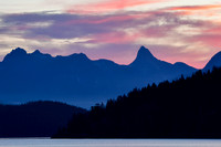 Snnrise behind Mount Aiken and Mount Denman from Feather Cove