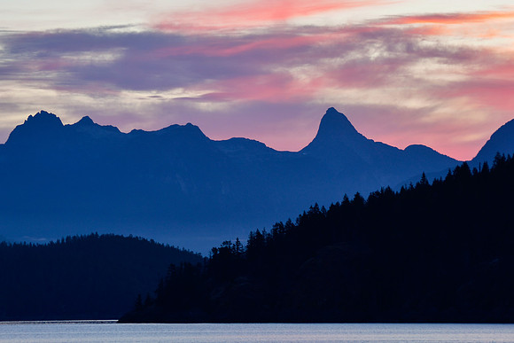 Snnrise behind Mount Aiken and Mount Denman from Feather Cove