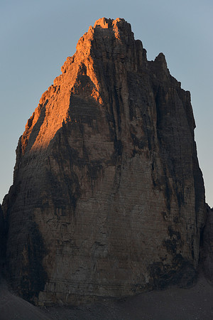 Sunrise on the central tower of the Tre Cime di Lavaredo from Rifugio Locatelli