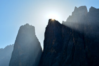 The sun rises behind Crode Fiscaline, with Cima Una on the left