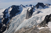 Anniversary Peak, the Hound's Tooth, Marmolata Mountain and the Bugaboo Glacier from the summit of Eastpost Spire