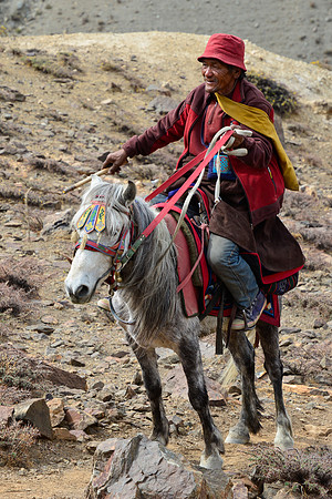 A man heading to Yanjer Gompa on Buddha's birthday