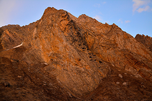 Sunset on the rock face beside Lar Tsa Camp