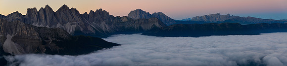 The Odle and Sassolungo before sunrise from Rifugio Plose, with the Catinaccio group in the distance on the right