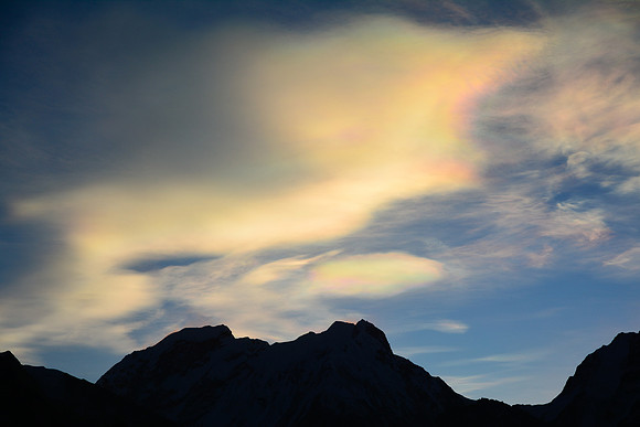 Iridescent clouds over Tent Peak and Nepal Peak from Lhonak