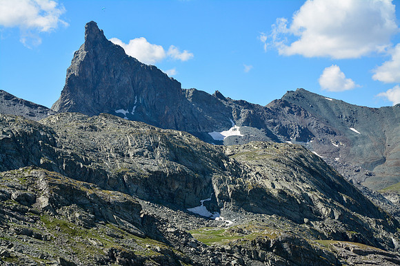 The Tête des Toillies from the trail to the Col de St. Véran (note the green paraglider above the peak)