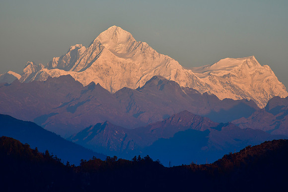 Sunrise on Makalu and Chomolonzo from Dhor, with Lhotse visible to the left of Makalu and Mount Everest hidden behind Makalu