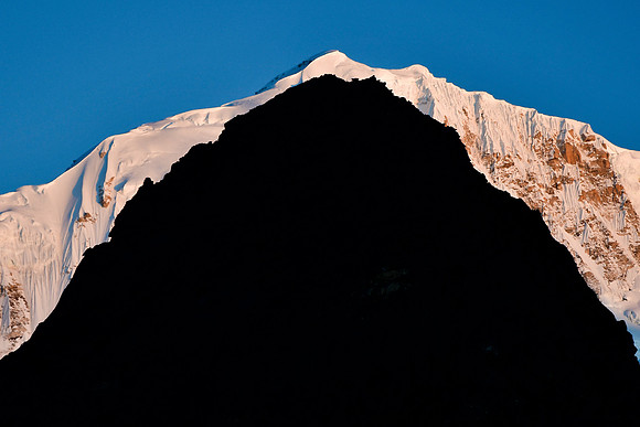 Kabur silhouetted against Kabru South from Dzongri Top