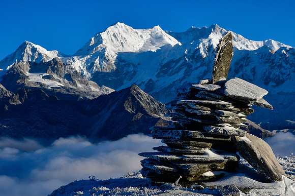 Early morning light on Rathong, Kabru and Kangchenjunga from the ridge northeast of Danphebir Pass