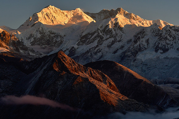 Sunrise on Kabru and Kangchenjunga from the ridge northeast of Danphebir Pass