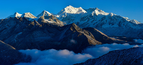 Early morning light on Jannu, Kokthang, Rathong, Kabru and Kangchenjunga from the ridge northeast of Danphebir Pass