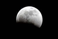 The moon entering the earth's shadow
