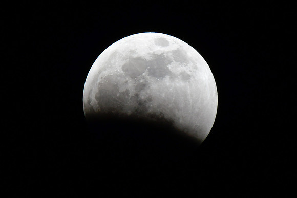 The moon entering the earth's shadow