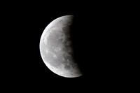The moon leaving the earth's shadow