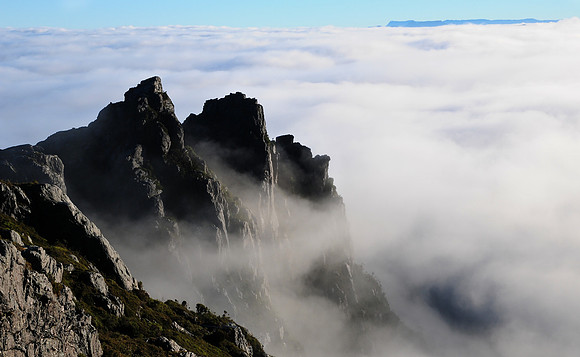 Looking north over a sea of cloud from the ridge above Lake Cygnus, Western Arthur Range, Southwest National Park
