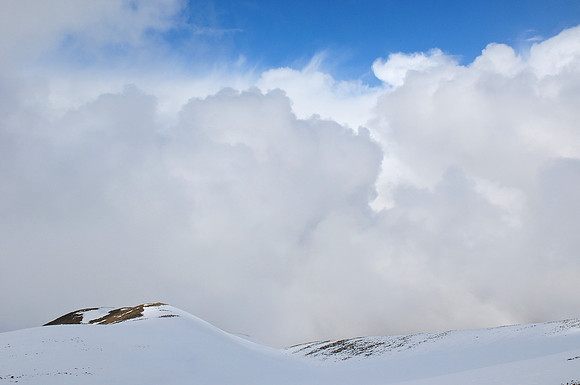 A few moments of blue sky from 3500 metres on Igoudamen in the Central High Atlas Mountains