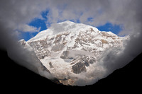 The clouds part to reveal Jomolhari from Jomolhari Camp
