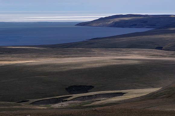 Castel Bay with the sea ice of the Beaufort Sea in the distance