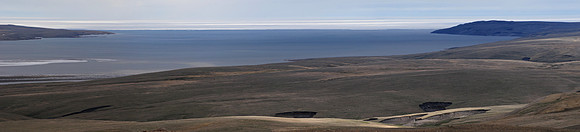 Castel Bay with the sea ice of the Beaufort Sea in the distance