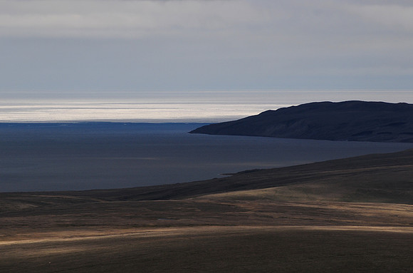Castel Bay with the sea ice of the Beaufort Sea in the distance