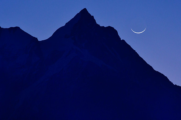 A sliver of moon before sunrise from Chumling