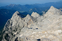 Evening view towards Begunjski vrh and Rjavina from Triglav's summit