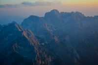 Sunrise view towards Skrlatica from Triglav's summit