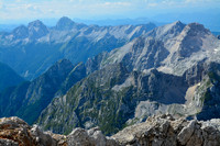 Looking northwest from Triglav's summit, with Jalovec and Mangart on the left and Prisank and Razor on the right