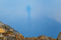 A ghostly apparition hovers in the mist above Triglav's summit