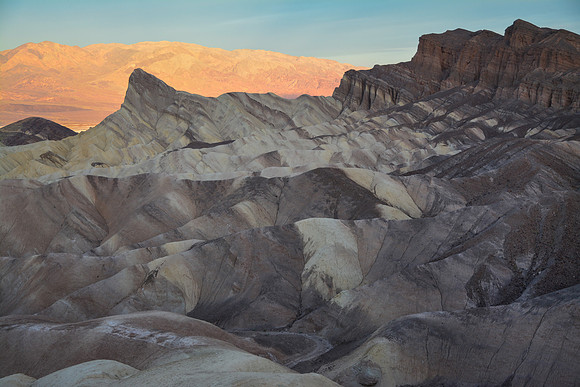 First light behind Manly Beacon from Zabriskie Point, Death Valley National Park